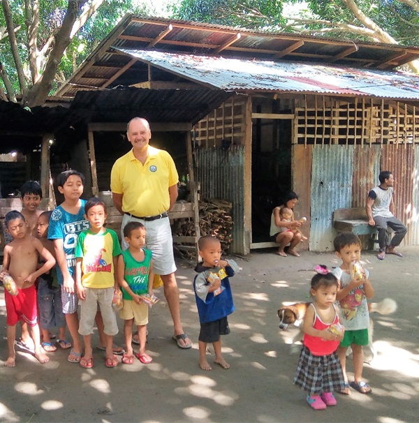 Ron Brown, CEA Director with children