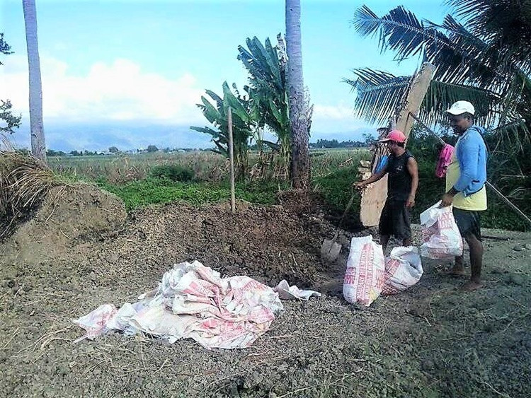 workers at cea otphanage site