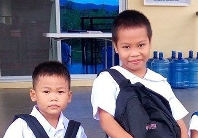 Jellian and Albert Junior in their school uniforms getting ready for school 2