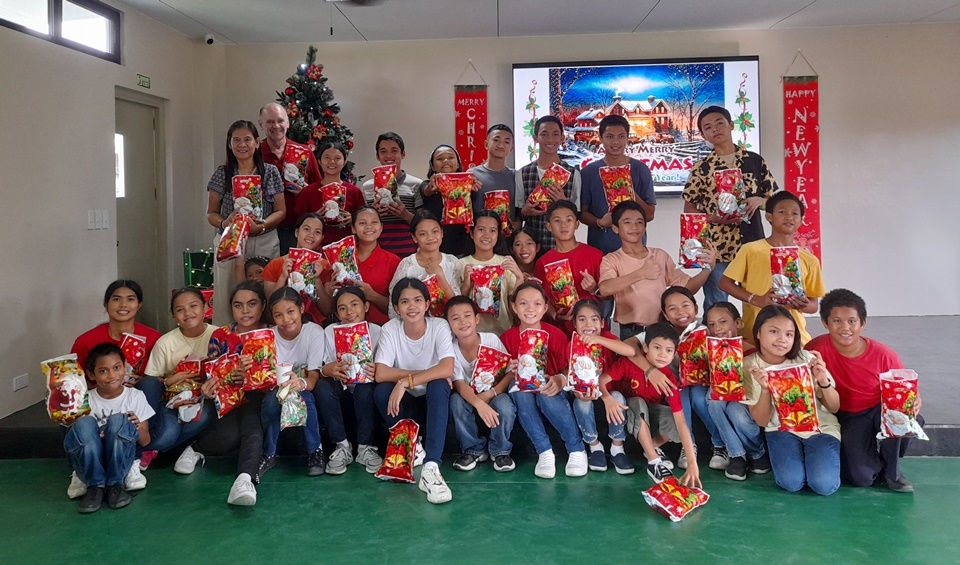 The CEA children with their gifts during the CEA Christmas 2024 party.